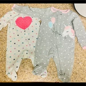 2 Carter’s NB zipper pajamas
